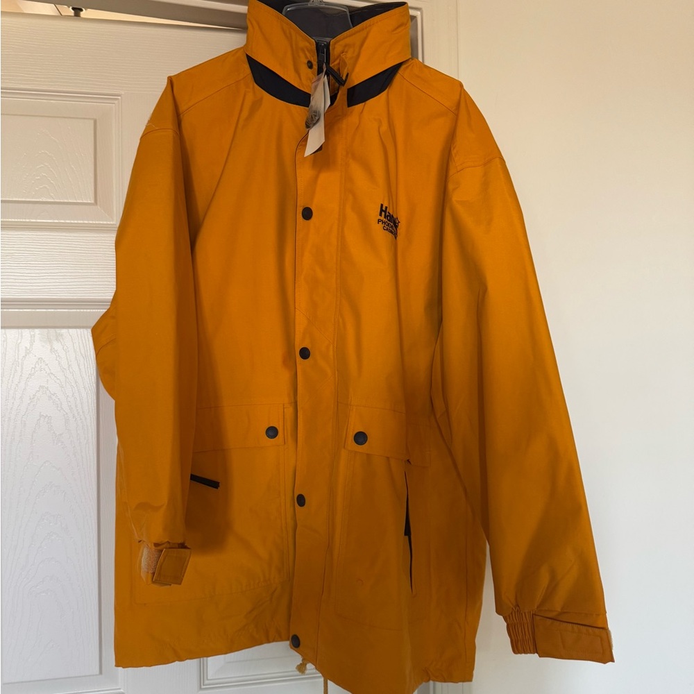 NWT Rivers End with packable hood yellow weatherproof rain coat size XL.